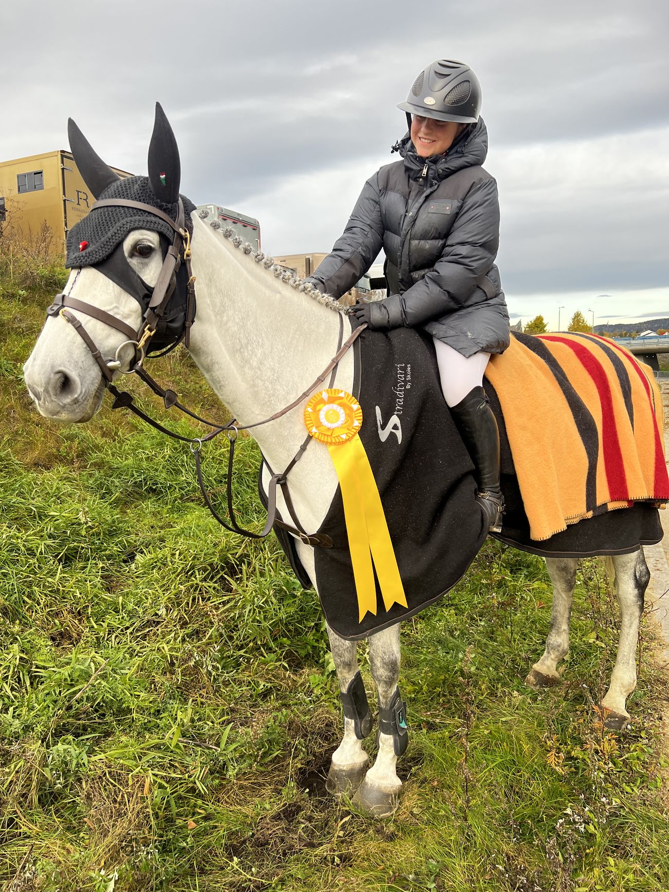 Bertine with her horse after a competition